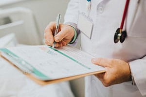 Doctor holding a clipboard 