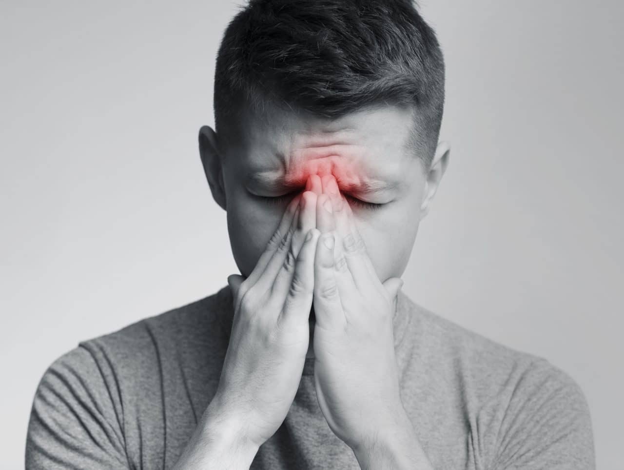 Black and white photo indicating nasal damage on a man.