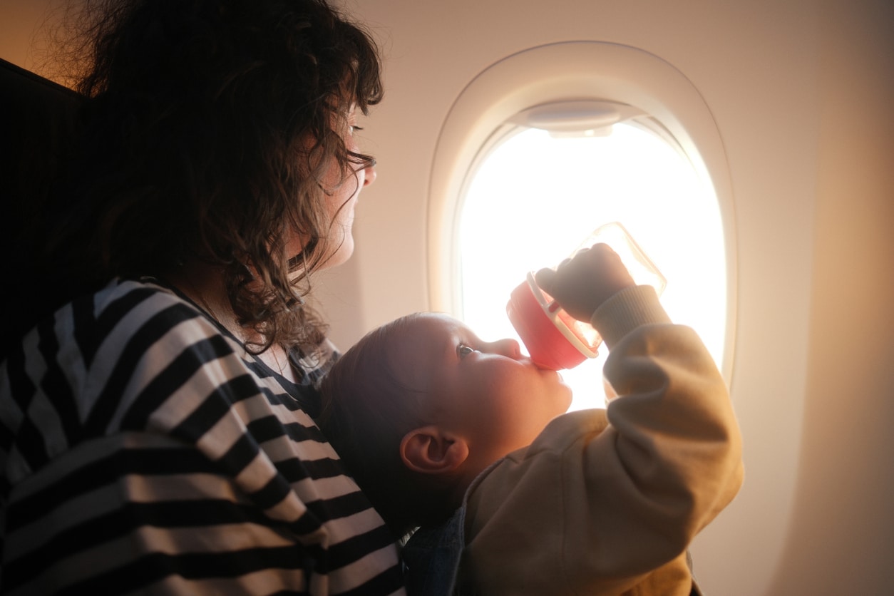 Baby flies on airplane